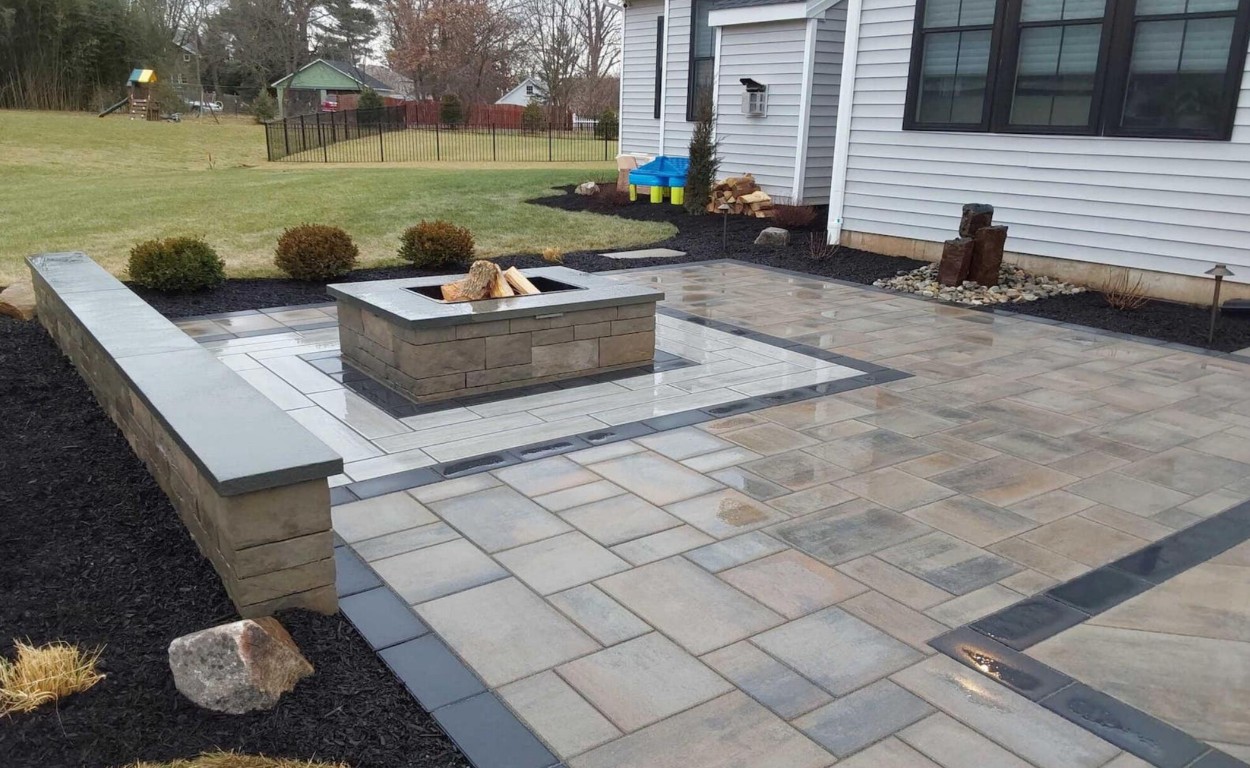 Custom concrete patio with fire pit in Enid, OK